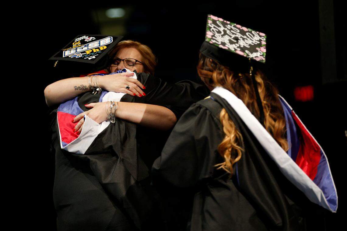 Fresno State “first lady” Mary Castro gives out one of her trademark hugs during a May 2018 commencement at Save Mart Center. Mary’s hugs have become something of a graduation ceremony tradition.