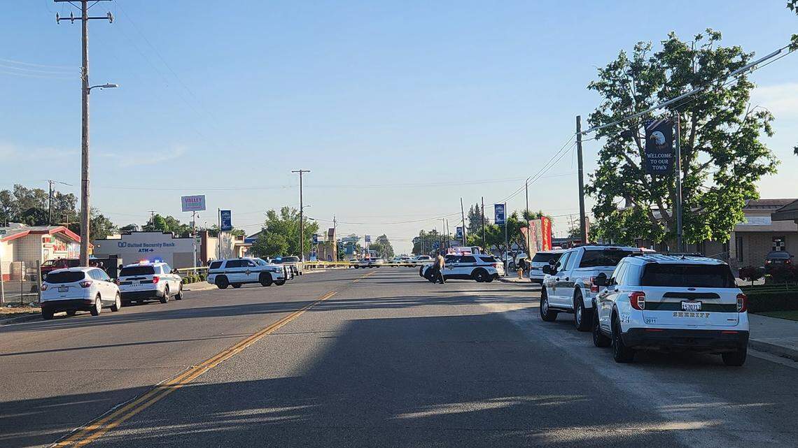 The Fresno County Sheriff’s Office closed Tahoe Avenue in Caruthers, California, to traffic after a deputy shot a suspect on Tuesday, May 16, 2023.