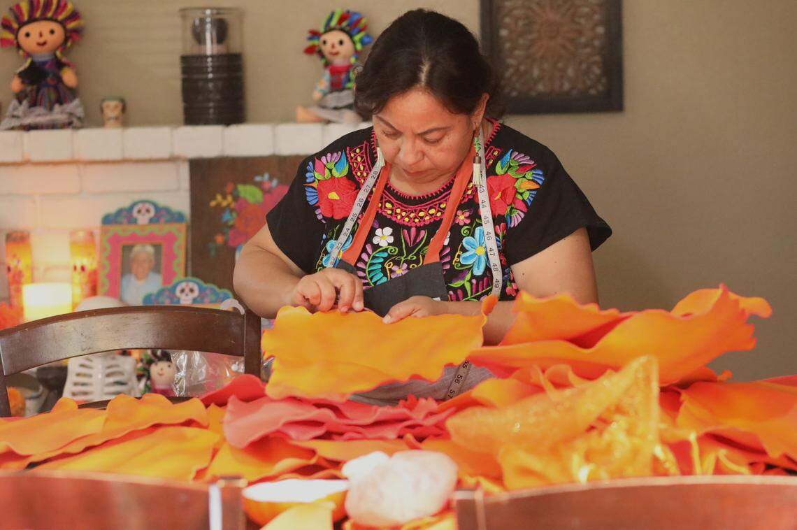 Leticia Valencia has brought La Catrina of Visalia to life for over a decade. She and her husband, Claudio Martínez, create the dresses La Catrina wears each year.