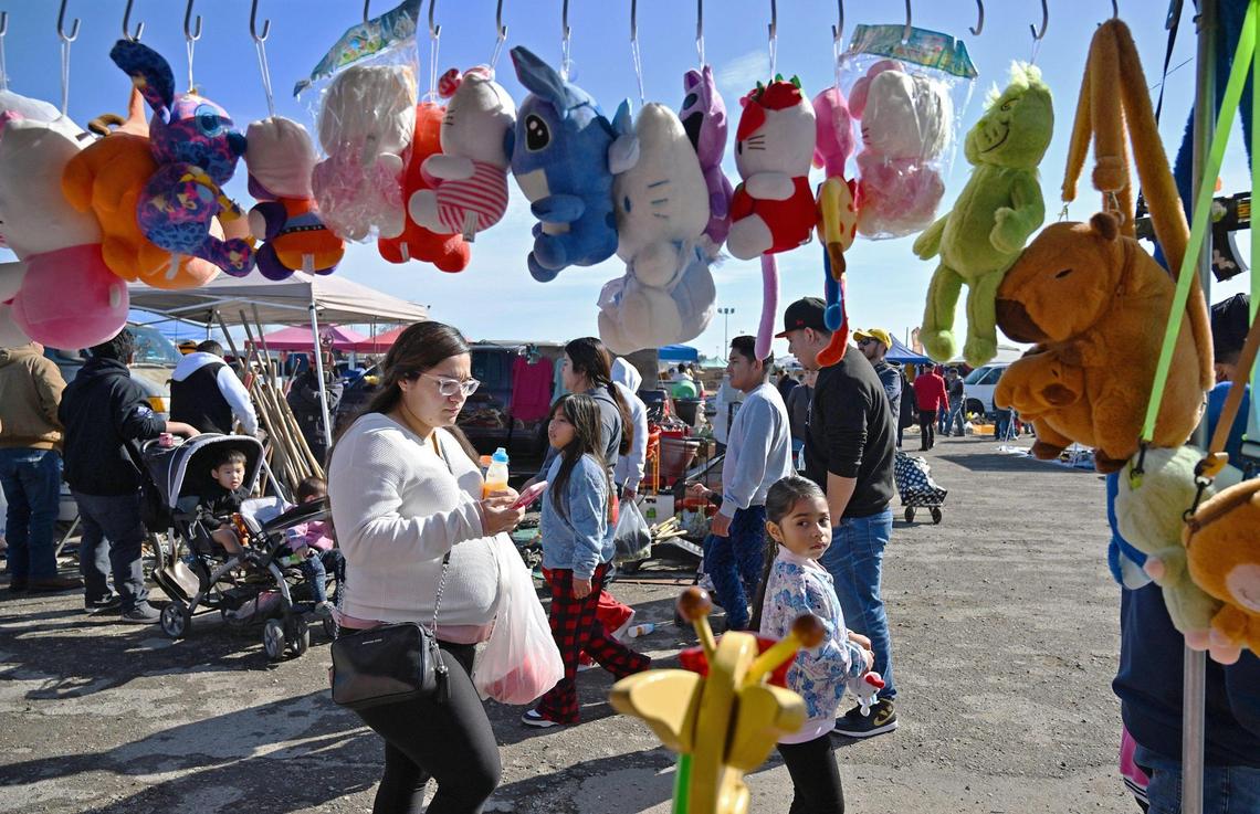 Shoppers stroll the busy Fresno Flea Market Sunday Feb. 16, 2025 in Fresno.