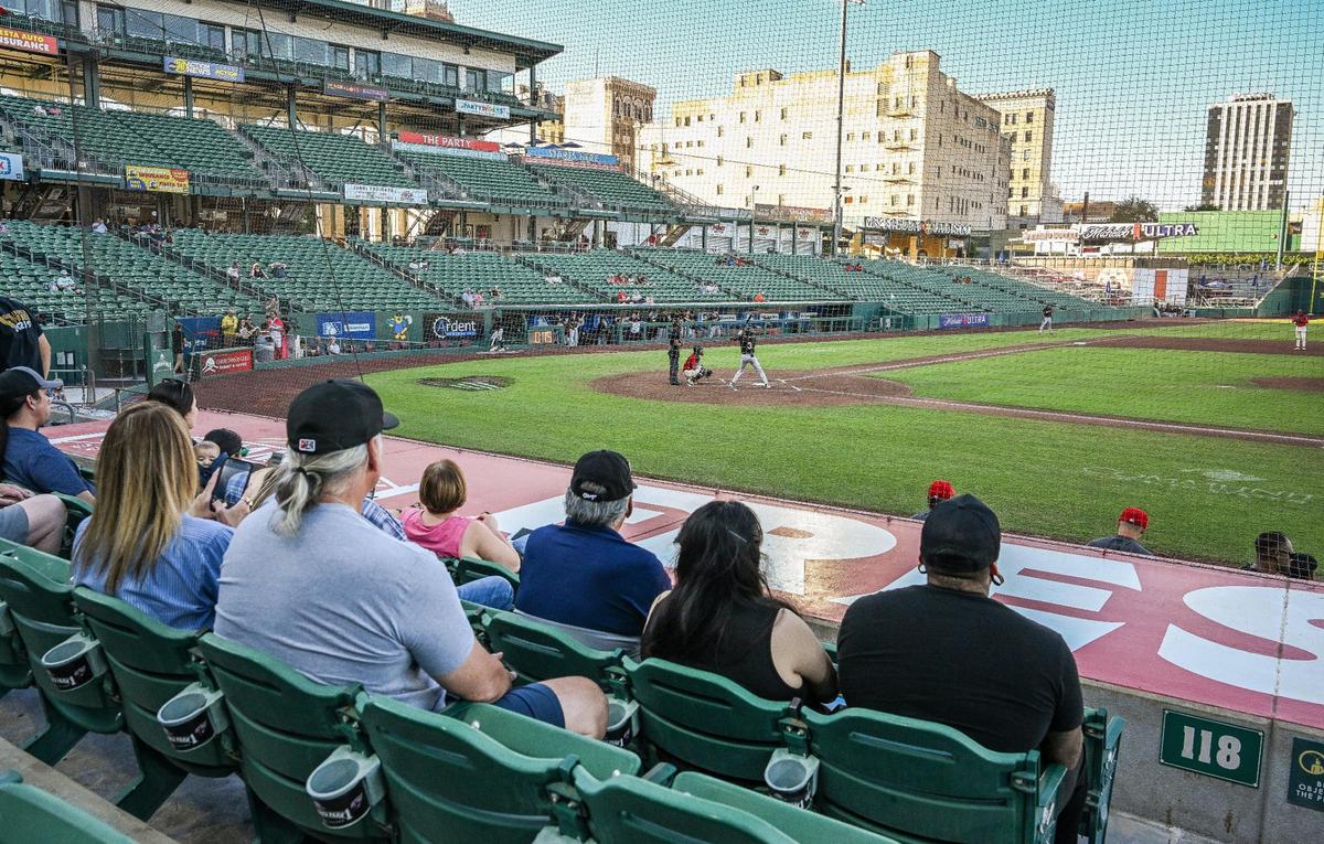 Fans take in the action of a Fresno Grizzlies baseball game during a series against the Modesto Nuts at Chukchansi Park in downtown Fresno Wednesday, June 11, 2025.
