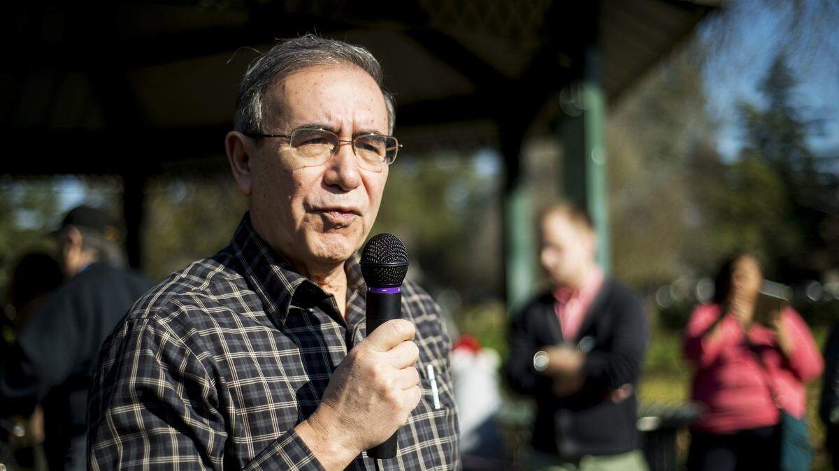 Golden Valley Health Centers Dr. Salvador Sandoval speaks during a memorial service for the homeless at Applegate Park in Merced in 2016. Today, as Merced County health officer, Sandoval is warning about hospitals being overrun due to the coronavirus pandemic.