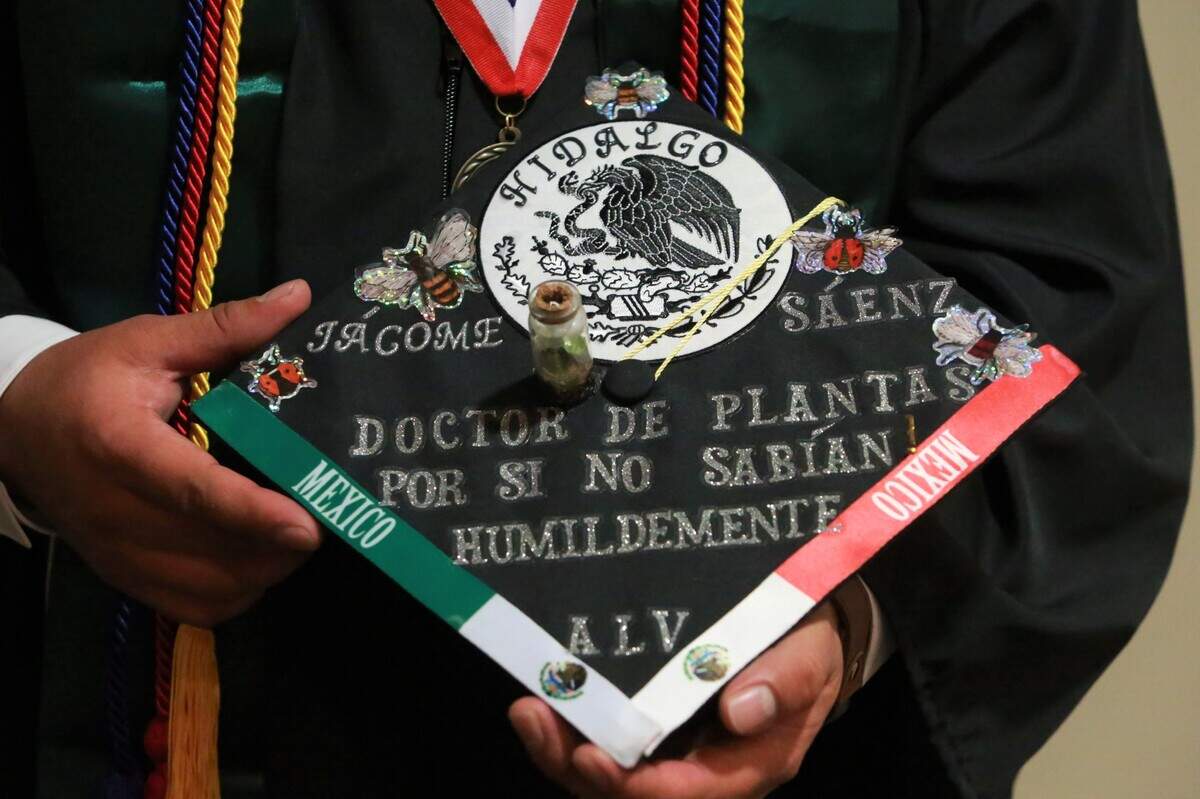 Fresno State’s Héctor Jácome-Sáenz holds his cap during the Jordan College of Agricultural Sciences and Technology graduation ceremony Friday (May 20) afternoon at the Save Mart Center. Jácome-Sáenz was selected as the undergraduate dean’s medalist for the Jordan College of Agricultural Sciences and Technology. He earned his bachelors’ degree in plant science with a 4.0 GPA.