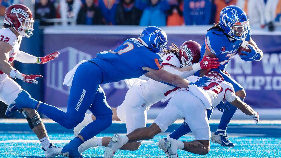 Boise State wide receiver Latrell Caples carries the ball in the first quarter of their Mountain West Championship game against Fresno State held on Saturday, Dec. 3, 2022 at Albertsons Stadium.
