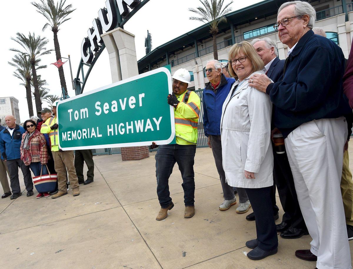 Friends, fans and former teammates of local baseball legend Tom Seaver, gather for photos with the signage that will name a section of Highway 41 as “Tom Seaver Memorial Highway” Friday March 4, 2022, at Chukchansi Park. Seaver died on August 31, 2020 at age 75. A unanimous Baseball Hall of Fame selection in 1992, Seaver first played the game at Fresno High and Fresno City College. In his big-league career, Seaver compiled 311 wins and won three NL Cy Young Awards as the league’s best pitcher. He’s also regarded as the leader of the New York “Miracle” Mets’ World Series championship team in 1969, when he won a major league-leading 25 games during the regular season.