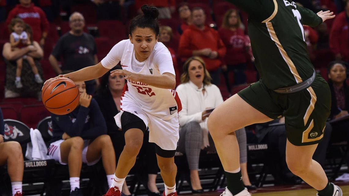 Fresno State’s Aly Gamez, left, drives past Colorado State’s Makenzie Ellis in action last month in Fresno. On Wednesday, Feb. 5 in Fort Collins, Gamez scored a career-high 27 points against the Rams. She drained 11 of 13 shots from the field, including 5-of-7 shooting on 3-pointers.