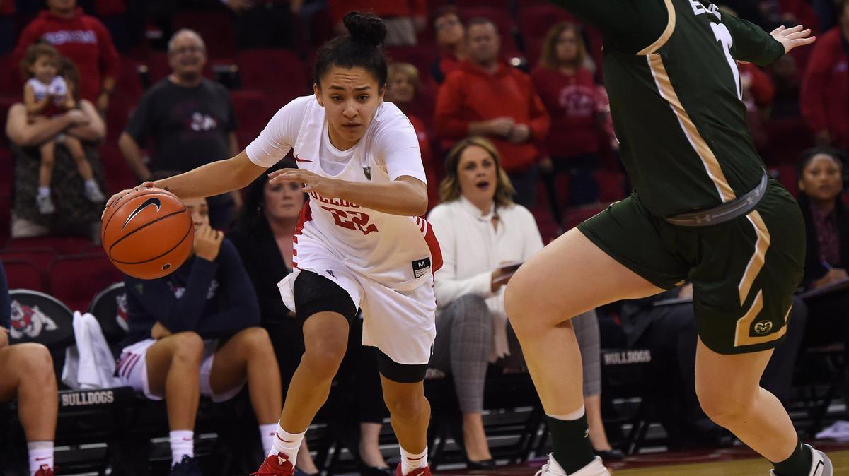 Fresno State’s Aly Gamez, left, drives past Colorado State’s Makenzie Ellis in action last month in Fresno. On Wednesday, Feb. 5 in Fort Collins, Gamez scored a career-high 27 points against the Rams. She drained 11 of 13 shots from the field, including 5-of-7 shooting on 3-pointers.