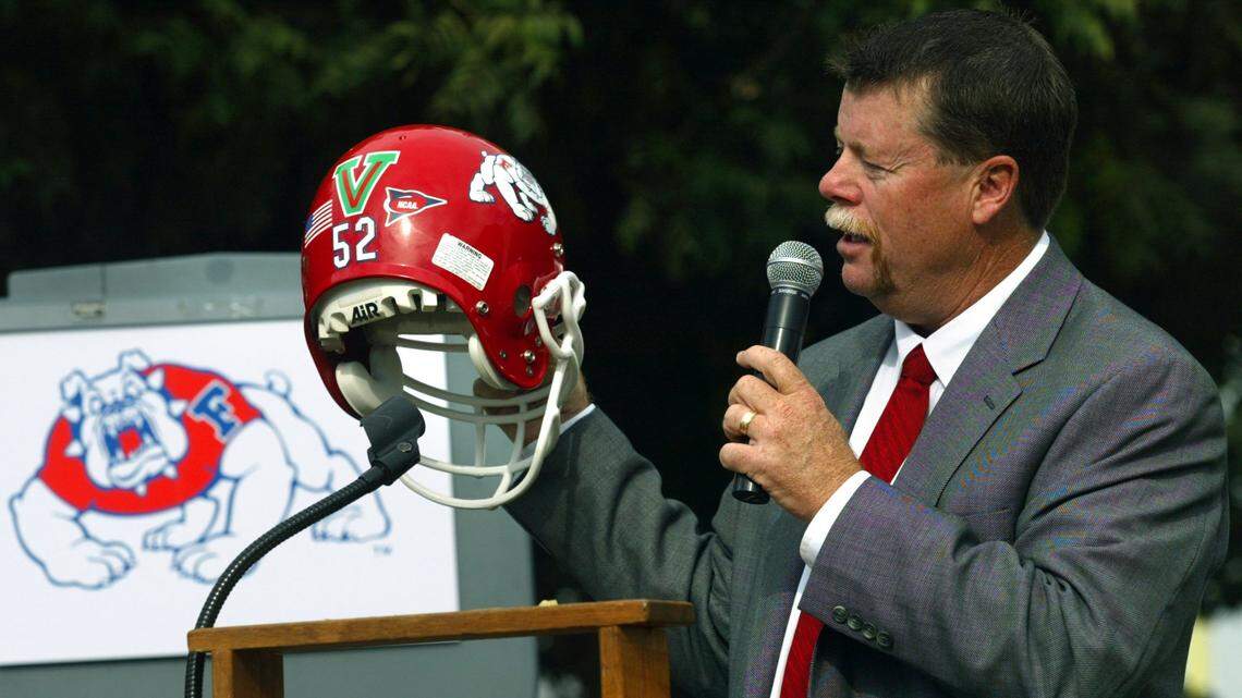 Former Fresno State football coach Pat Hill introduces the Green V helmet decal in this October 2003 photo.