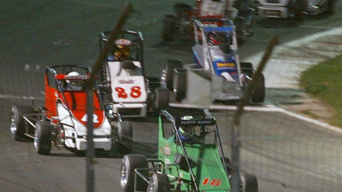 Midget racers during a qualifying heat at the Madera Speedway in 2004.