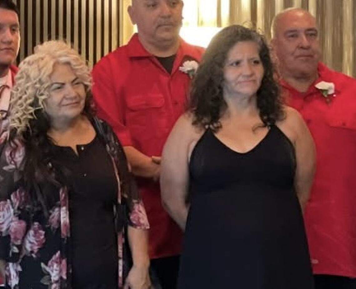 Denise Celis, right, and sister Margarita Alvarez, left, photographed at their brother’s funeral in 2024.