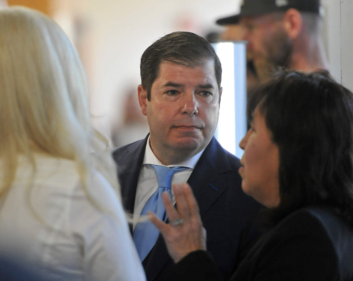 Assemblyman Joaquin Arambula listen to his attorney Margarita Martinez-Baly, right,  in the hallway of Superior Court, Tuesday morning, April 23, 2019,  for the beginning of his trial on a misdemeanor child cruelty charge stemming from his December arrest on allegations he injured his 7-year-old daughter.