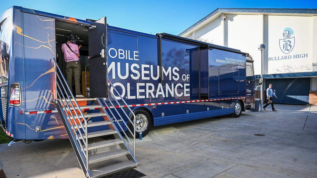 The mobile Museum of Tolerance gets set up at Bullard High School in Fresno for an open house event inviting the public to participate in its lessons of tolerance on Thursday, Feb. 12, 2026. The bus is an outreach segment of the Museum of Tolerance in Los Angeles.