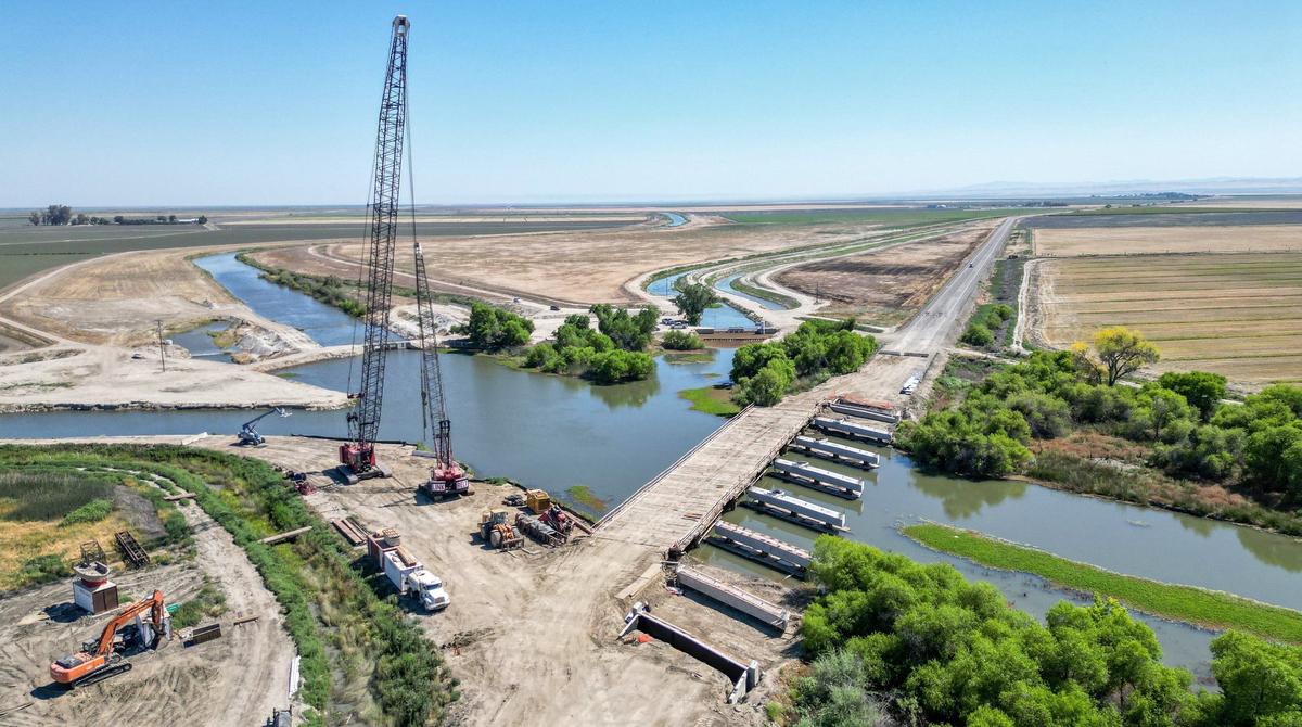 The Kings River bridge on Highway 41 near Stratford in Kings County is shown under construction in this drone image on Thursday, May 16, 2024. The former bridge was built in 1942 and in need of replacement due to deterioration and seismic retrofitting requirements. The new bridge is expected to be completed later this summer.