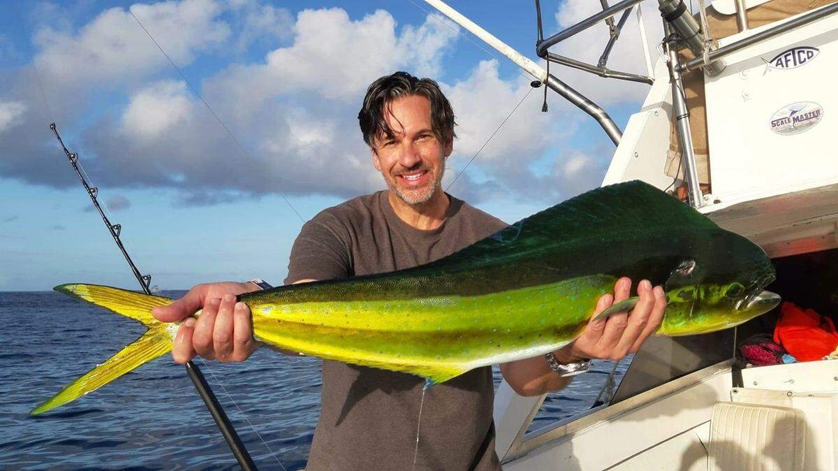 Jason Bailey of Visalia shows off a dorado caught on live bait just offshore on a recent trip to Cabo San Lucas with Top Anglers Sportfishing.