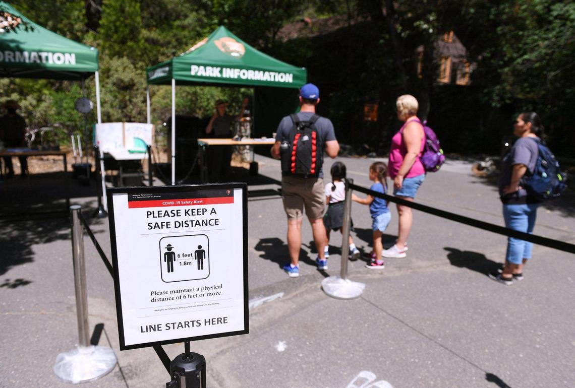 With the Visitor Center closed, informational booths are available for visitors as Yosemite National Park reopens after its historic closure Thursday morning, June 11, 2020.