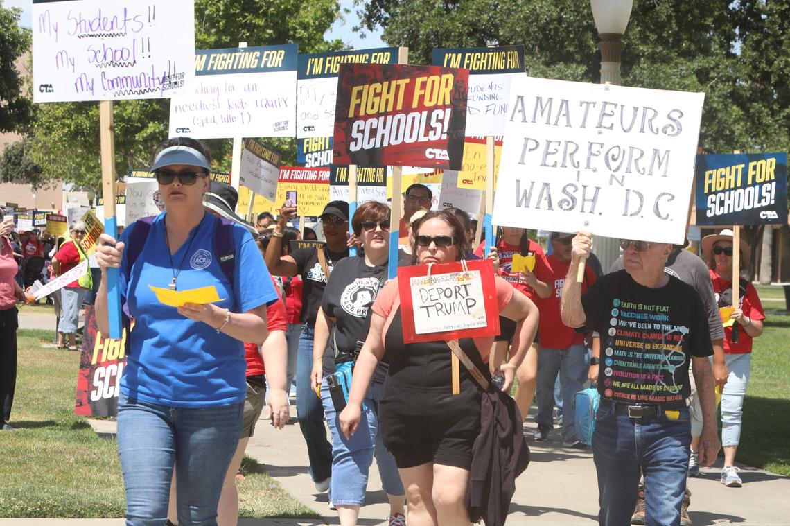 Hundreds of teachers from Merced, Madera, Fresno, Kings, Tulare and Kern counties rallied Saturday, May 17 morning for public education and marched for more than a quarter-mile chanting and carrying banners and signs to Valadao’s district office in Hanford urging the Republican congressman to protect federal funding and resources for public schools and students in vulnerable communities in the Central Valley.