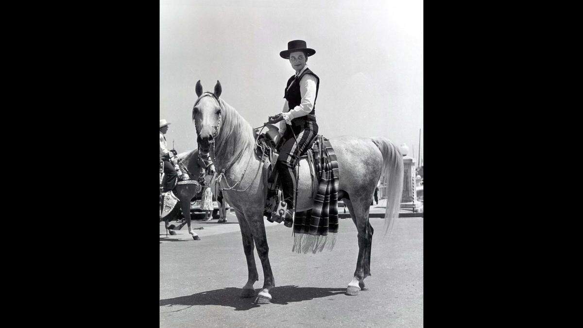 Paula Fatjo, shown here in a parade costume in 1956, was the great-great-granddaughter of Francisco Pacheco. She inherited 16,000 acres of Rancho lands, including Pacheco Pass, in 1948. When Paula died in 1992, she bequeathed over 6,800 acres to the people of California. Pacheco State Park was created on this land and was dedicated in 1997.