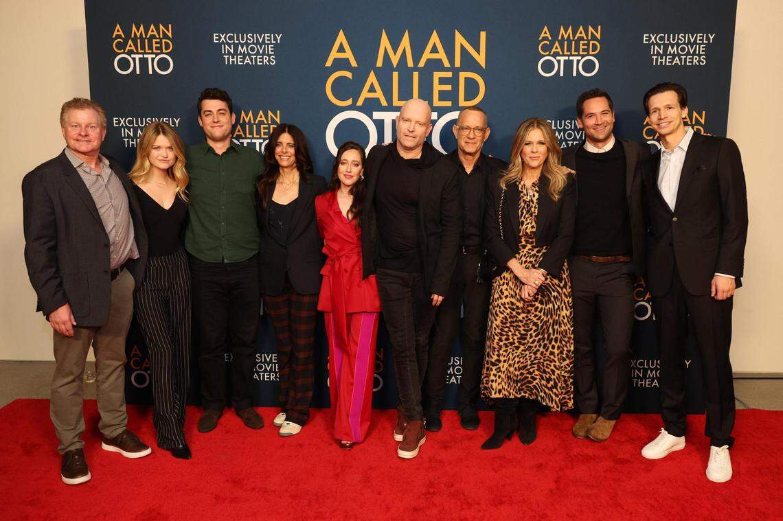 Screenwriter David Magee, Kelly Wilson, Truman Hanks, producer Renée Wolfe, Mariana Treviño, director Marc Forster, Tom Hanks, producer Rita Wilson, Manuel Garcia-Rulfo and producer Fredrik Nikastro attend a photo call for Columbia Pictures ‘A Mam Called Otto’ on Dec. 5, 2022, at the Academy Museum in Los Angeles.