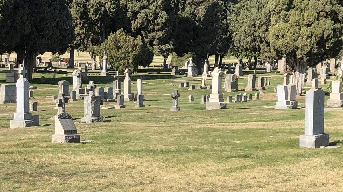 Headstones stand a silent vigil over graves at Fresno’s Mountain View Cemetery in this 2019 file photo.