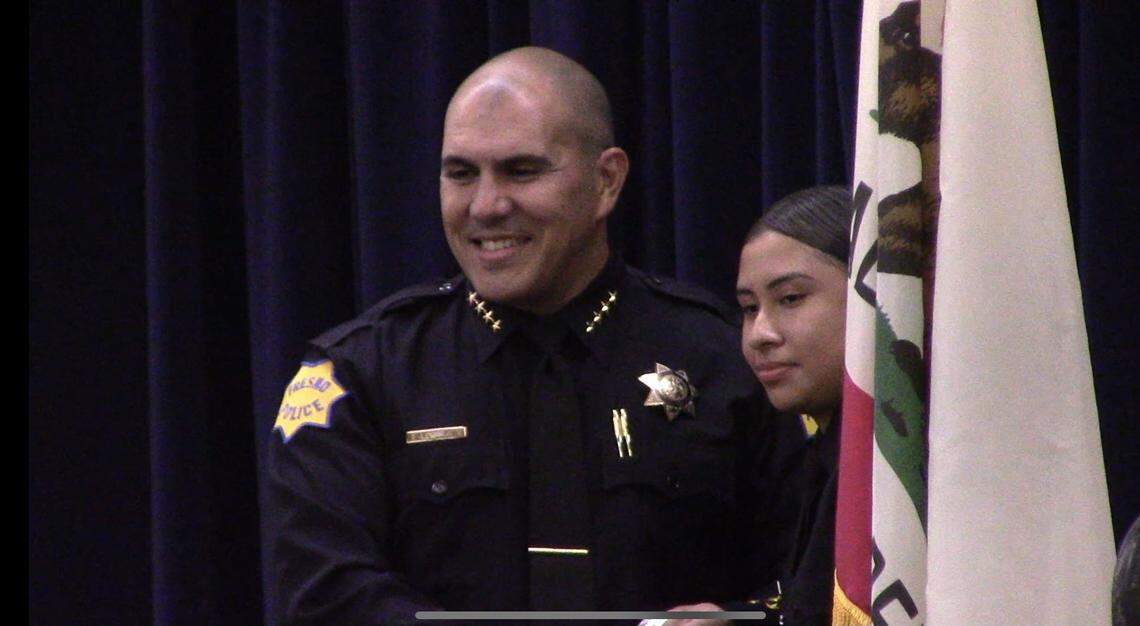 Rose Diaz is congratulated by Fresno Police Chief Paco Balderrama as she was sworn-in as an officer on Tuesday, Aug. 20, 2021.