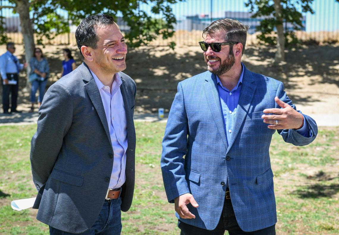 California Assembly Member Joaquin Arambula, right, and Assembly Speaker Anthony Redon chat during a press conference at Spano Park in Fresno on Tuesday, June 22, 2021. Arambula and Rendon were pushing for Assembly Bill 559 that would reshape the San Joaquin River conservancy board as well as $15 million earmark in the state budget for operations and maintenance of the San Joaquin River Parkway.