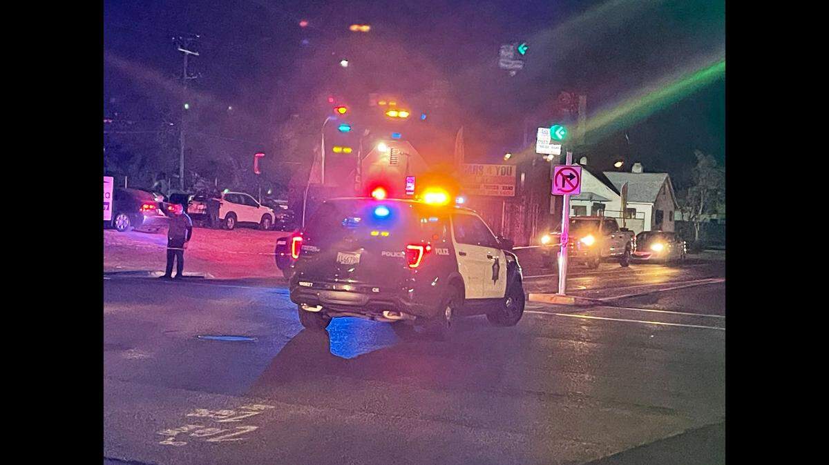 Fresno police investigate a collision involving a woman on foot and a driver Wednesday night at Olive Avenue and Abby Street near the Tower District.