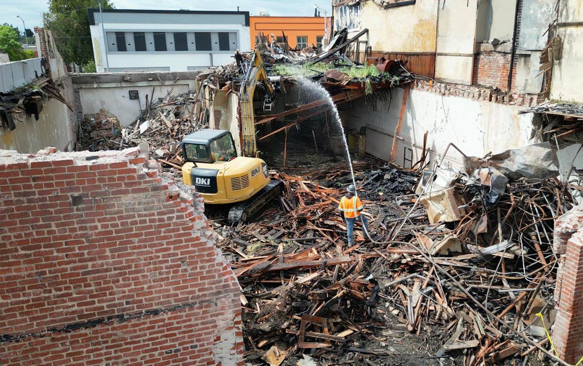 Demolition continues on the Bow On Tong Association building as part of the City of Fresno restoration plan in Chinatown, shown Tuesday, April 1, 2025 near downtown Fresno.