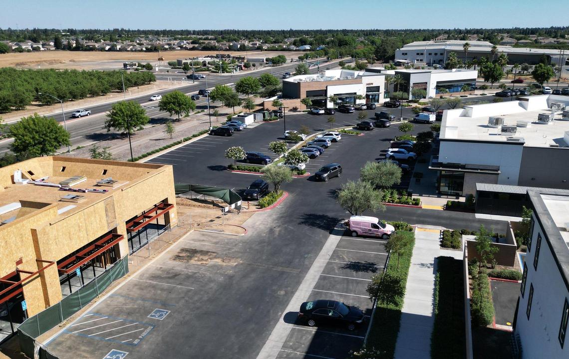The Row is a new development at the northwest corner of Willow and Shepherd avenues consisting of housing, offices and retail shops. The building at the bottom left will be The Habit. Willow Aenue is seen to the left. Photographed Wednesday, July 12, 2023 in Fresno.