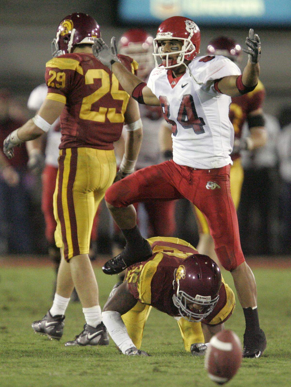 Fresno State receiver Joe Fernandez thought he should have received a pass interference call against USC's Josh Pinkard in this fourth-quarter pass play.