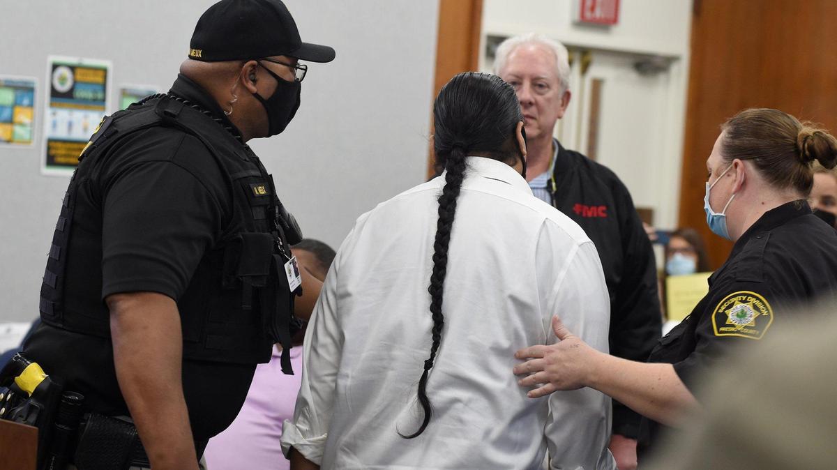 After turning his back on the Fresno County Board of Supervisors while he was speaking in favor of renaming Squaw Valley, Roman Raintree, Tribal Liaison for Seats of Sovereignty, is removed by security as requested by the board, Nov. 16, 2021.