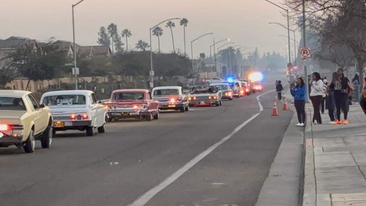 Classic cars drive down on Bryan Avenue to celebrate Central East’s football state championship on Thursday, Jan. 15, 2026.