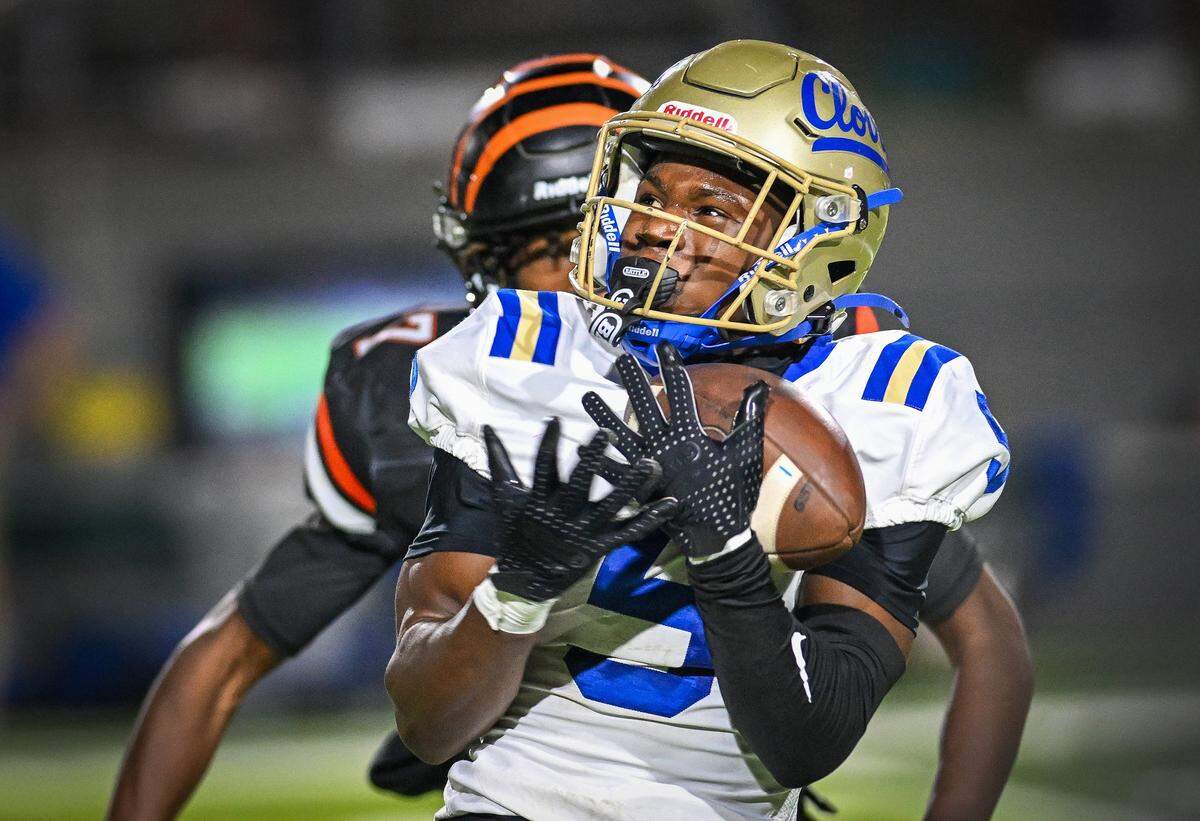 Clovis' Sterling Edwards makes a grab on a long pass play against Central East in their game at Koligian Stadium in Fresno on Friday, Oct. 24, 2025.