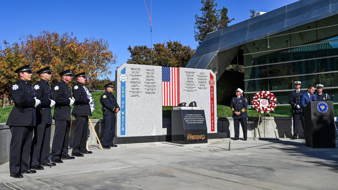 The new First Responders Memorial honoring city police officers and firefighters who lost their lives is unveiled outside Fresno City Hall during a ceremony on Wednesday, Nov. 2, 2022.