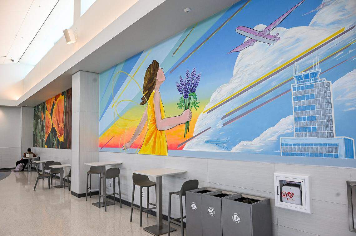 Murals cover walls in Concourse B, part of Fresno Yosemite International's $150 million terminal expansion project, on Tuesday, Jan. 13, 2026.