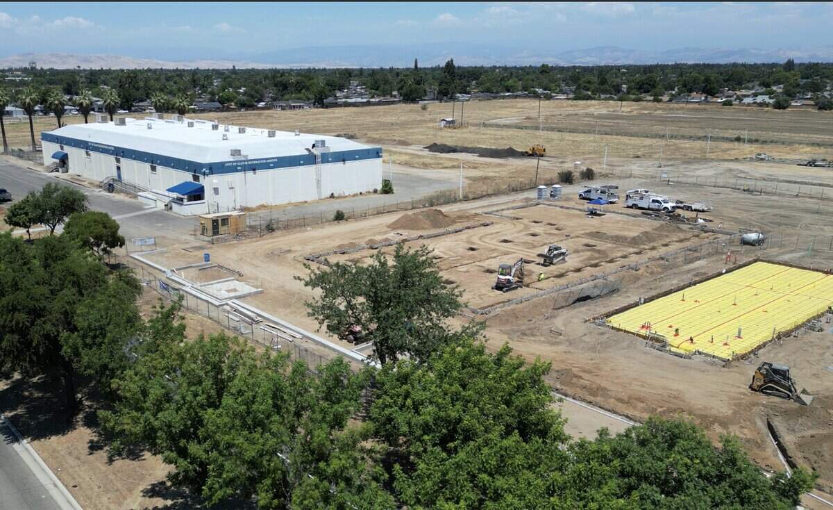 Construction is seen just south of the Clovis Recreation Center, seen at upper left, along Clovis Avenue at Dakota Avenue on Wednesday, June 17, 2026. A gas station will reportedly be built to the right in the photo.