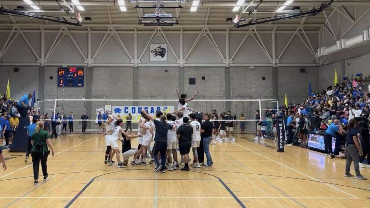 Clovis East celebrate a CIF Northern California Division I boys volleyball title with a win over Clovis in three sets on Saturday, May 20, 2023.