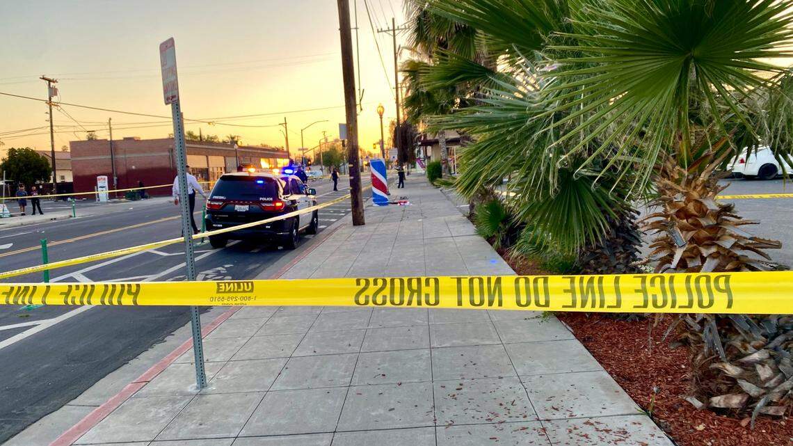 Police investigate a triple shooting after a disturbance inside a barbershop in Fresno, California on Saturday, April 19, 2025.