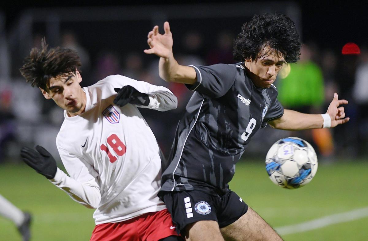 Buchanan’s Daniel Bazerkanian, left, with Clovis Norths Jeremiah Bruce, right, in a matchup for the Tri-Rver Athletic Conference boys soccer match Thursday, Feb. 9, 2023 in Fresno.