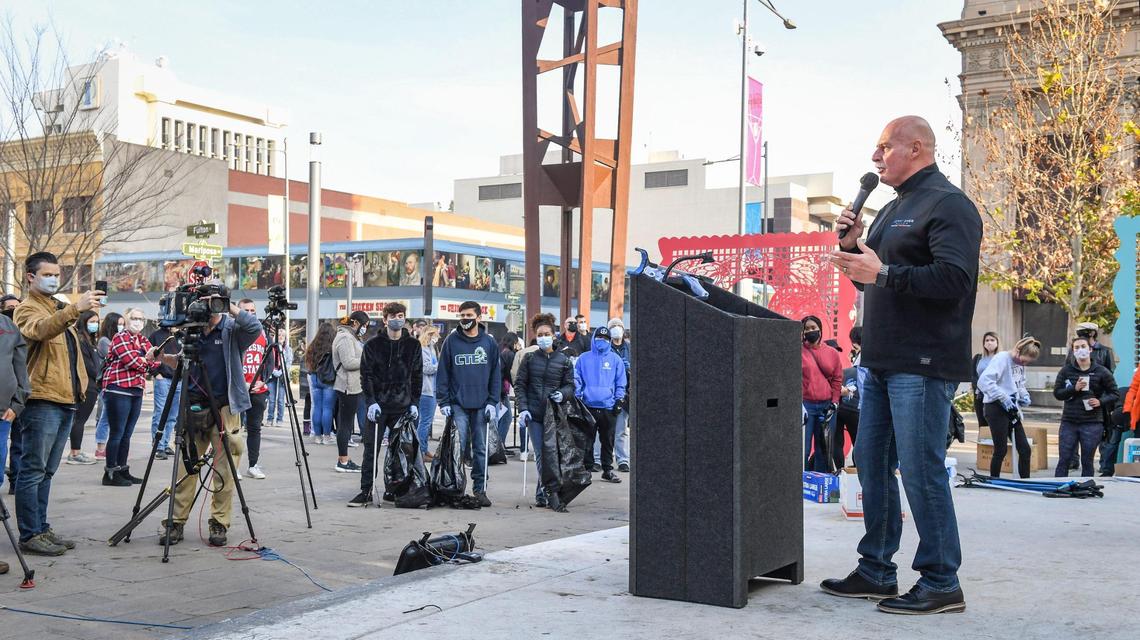 Mayor Jerry Dyer gives opening remarks at Mariposa Plaza in downtown Fresno before the start of two cleanup events as a part of his new initiative, Beautify Fresno, to celebrate the National Day of Service on Martin Luther King Jr. Day, Monday, Jan. 18, 2021. About 200 volunteers signed up for the event to pick up trash in the Fulton District and the Lowell District to honor the legacy of the late Reverend King. On Martin Luther King Jr. Day residents are encouraged to use the holiday as “a day on, not a day off” and look for ways to volunteer to make their communities better.