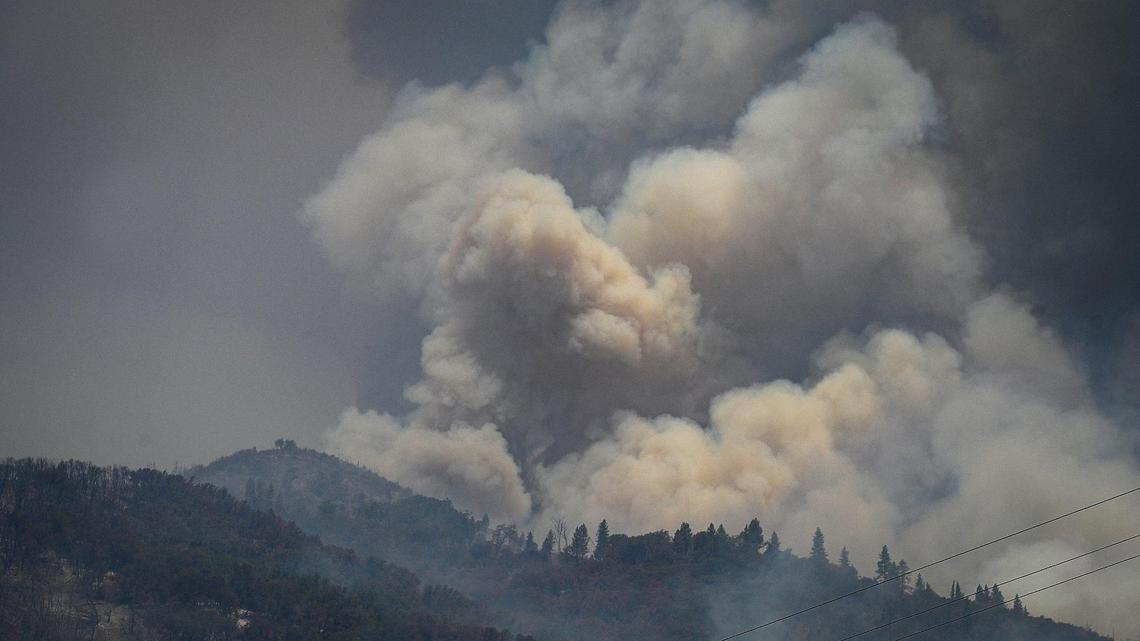 Smoke billowing from a mountainside east of Mariposa as the Oak Fire raged near Yosemite National Park in July.