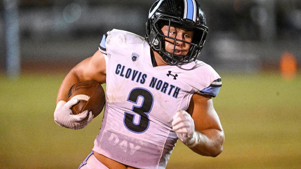 Clovis North’s McKay Madsen turns the corner on a run to the outside against Central Valley Christian during their game at CVC on Friday, Sept. 8, 2023.