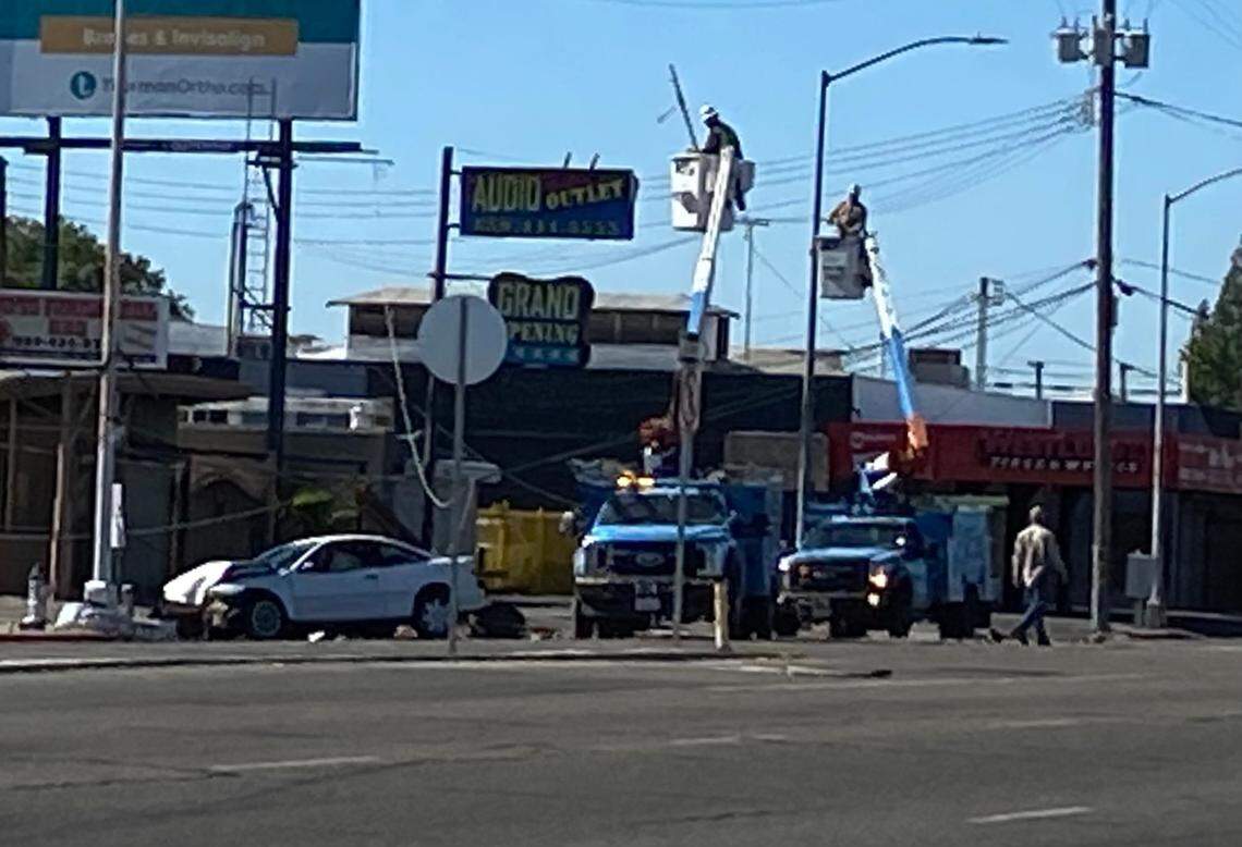 The driver of a car reportedly fell asleep at the wheel before hitting a power pole at Blackstone and Pine avenues in central Fresno shortly after 8 a.m. Saturday, June 12, 2021. PG&E crews tended to downed lines, with power interrupted to more than 600 customers.