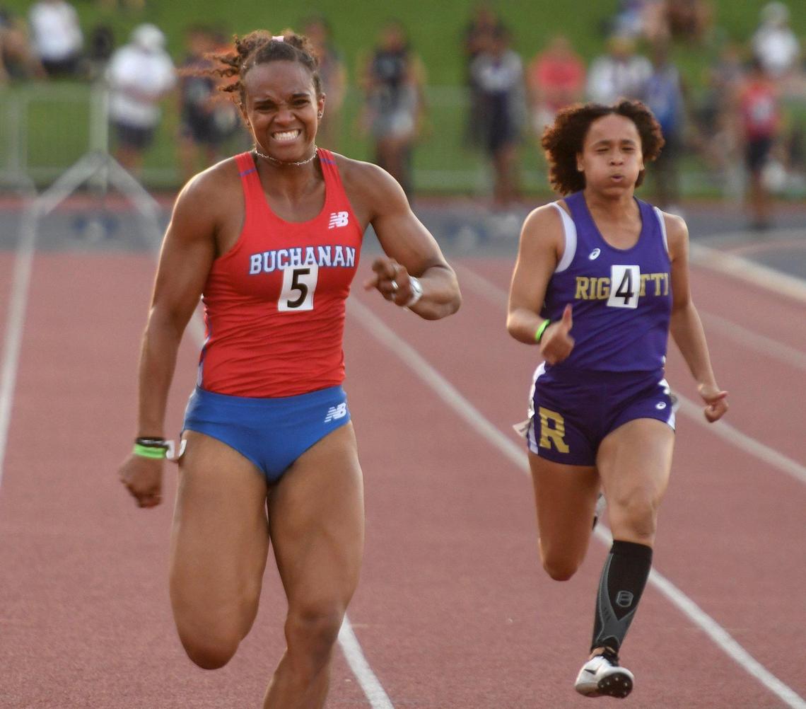 Buchanan’s Lauren Fowler wins the 100 meters race, ahead of Righetti’s Rayann Booker, right, during the CIF Central Section Masters Track and Field 2021 Championships at Buchanan High, Saturday June 19, 2021.