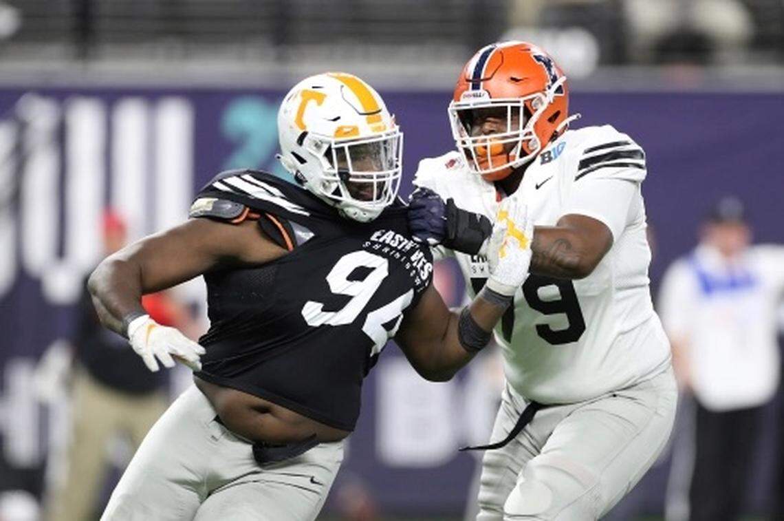 Matthew Butler, left, was selected by the Las Vegas Raiders in the fifth round of the NFL draft on Saturday, April 30, 2022.