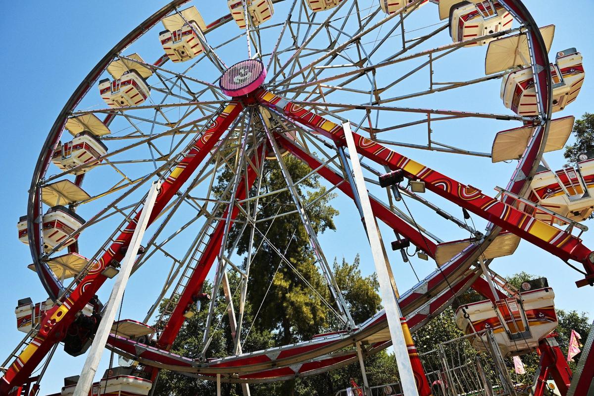 The Century Wheel ferris wheel is seen at Playland Fresno in Roeding Park Thursday morning, June 20, 2024 in Fresno.