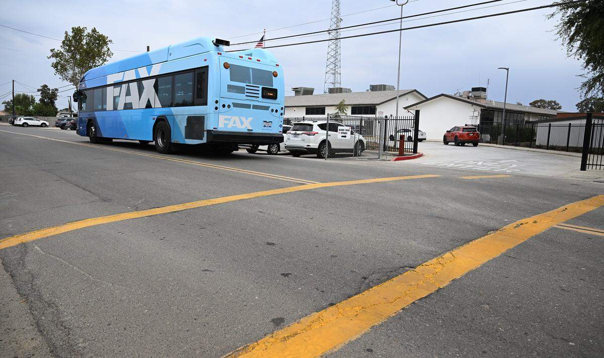 A FAX bus passes the Orange Center School District office along S Cherry Ave. Thursday, Sept. 18, 2025 near Fresno.