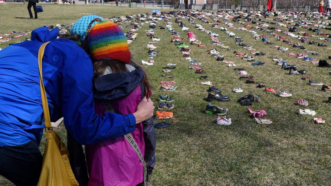 Thousands of small shoes litter the ground in front of the Capitol building in Washington, D.C., on Tuesday, one pair for each of the estimated 7,000 children who have died from gun violence since the Sandy Hook Elementary School shooting in 2012.