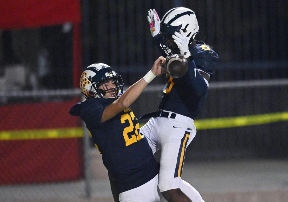 Sunnyside’s Ethan Ros, right, celebrates quarterback Tanner Wilson’s long run for a touchdown, left, against Redwood in the third quarter of the Central Section D2 playoff game Friday, Nov. 3, 2023 in Fresno. Sunnyside won the game 39-21.