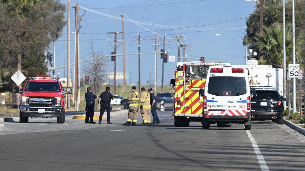 Police and emergency crews set up at the scene of a suspicious ice chest that bomb that squad crews detonated as a precaution near Armstrong Avenue and Kings Canyon Boulevard on Tuesday, March 8, 2022.
