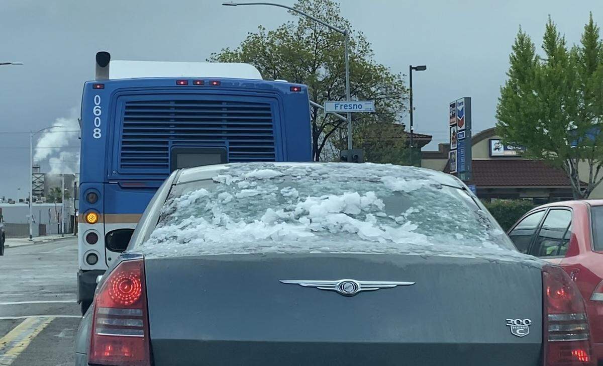 Hail on a vehicle in downtown Fresno, California on Friday, April 5, 2024.